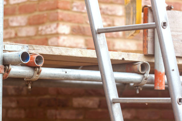 istock Building  project or renovation, construction with scaffolding and ladder 1344958773