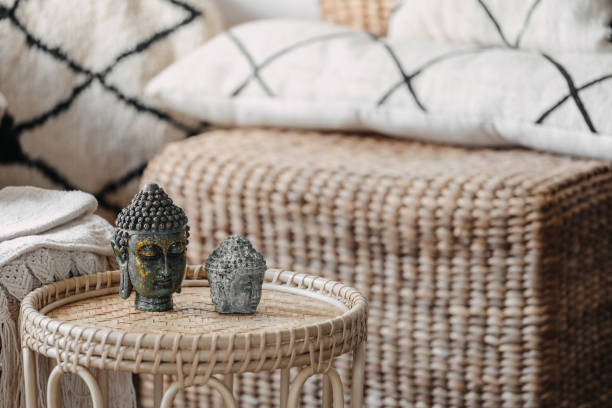 istock Two Buddha head statue on coffee table in room 1344961390
