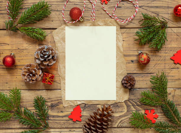 istock Christmas Composition with a blank card over wooden table flat lay 1344961817