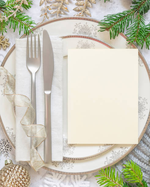 istock Festive table setting of with fir tree branches and Christmas decorations 1344961829