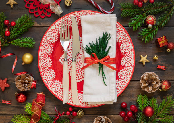 istock Festive table setting with fir tree branches and Christmas decorations 1344961847
