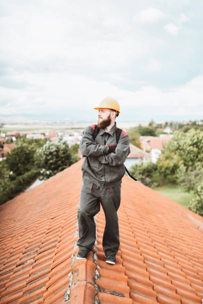 istock Smiling Worker Standing On House Roof Not Afraid From Height 1344963185
