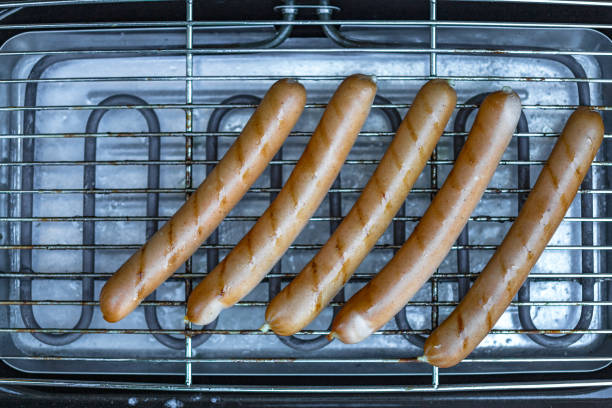 Knack sausages on an electric barbecue