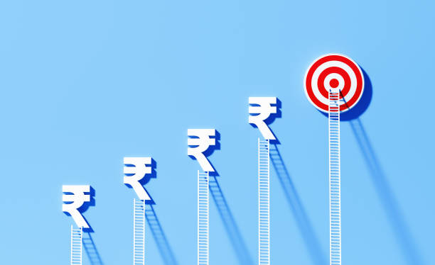 istock White Ladders Leaning Onto Rupee Signs And Bull's Eye Target on Blue Wall 1344968763