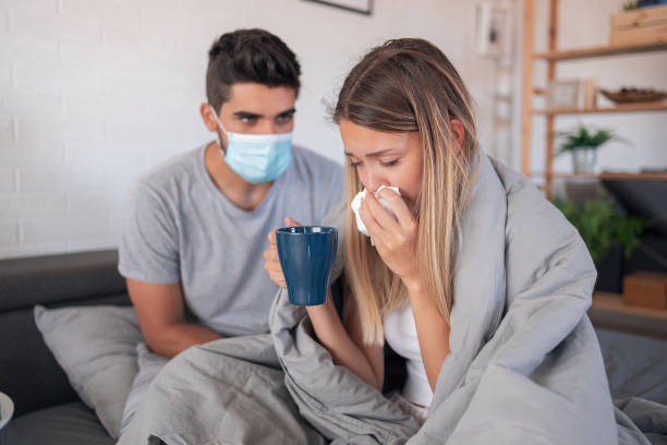 istock Sad sick woman crying 1344969675