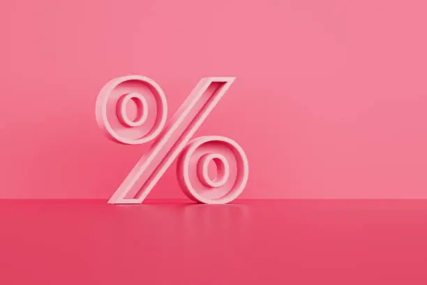 Red percentage sign on pink reflective background. Horizontal composition with copy space. Front view. Sale concept.