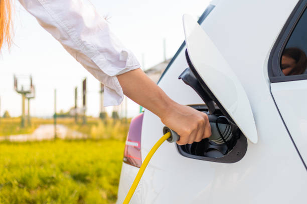istock EV charging near an electric power plant 1344977064