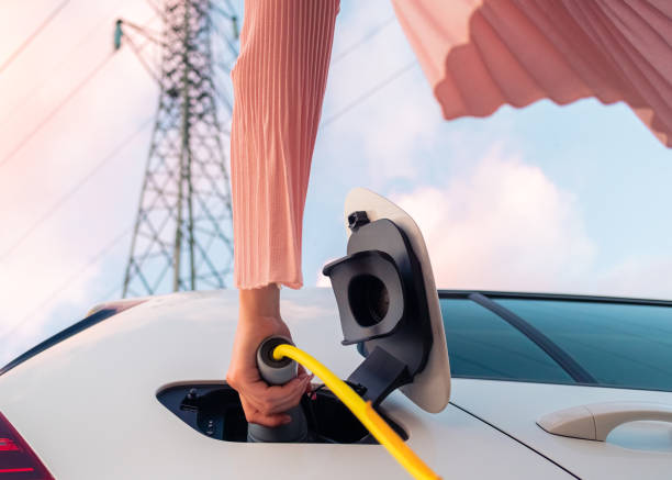 istock EV charging near an electric power plant 1344977112