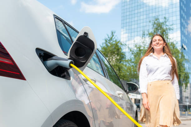 istock Plugging out the electric car charger 1344977134