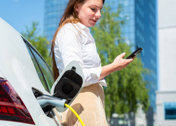 istock Waiting for electric car charging 1344977169