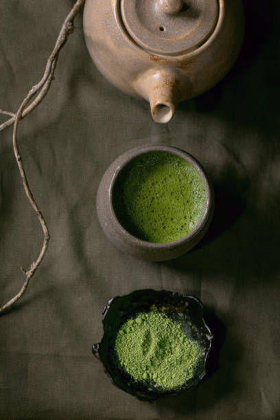 istock Traditional hot green tea matcha in ceramic cup 1344977216