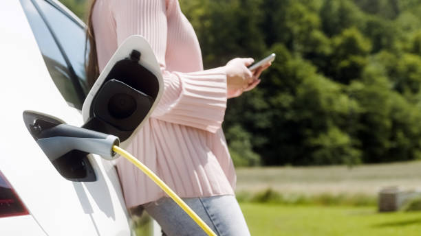 istock Waiting for electric car charging 1344977294