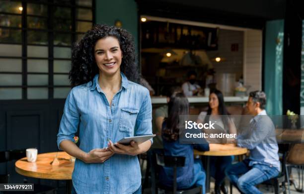 Portrait Of A Happy Business Owner Of An Outdoor Restaurant Smiling Stock Photo - Download Image Now