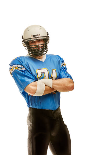 istock Proud american football player on white background 1344980461