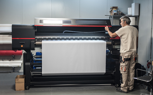Plotter Pic Technician Operator Works On Large Premium Industrial Printer Plotter ...
