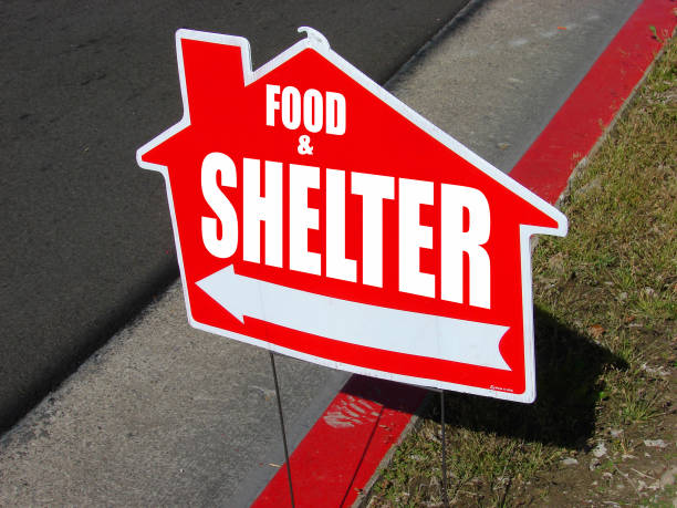 Shelter Food and shelter sign on street homeless shelter stock pictures, royalty-free photos & images