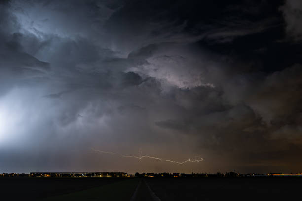 istock Orange colored horizontal lightning bolt above the horizon 1344982069