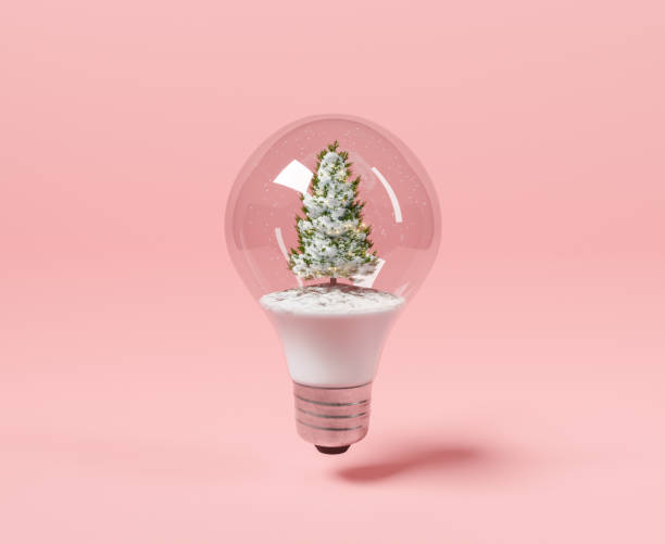 лампочка с елкой внутри - navidad стоковые фото и изображения