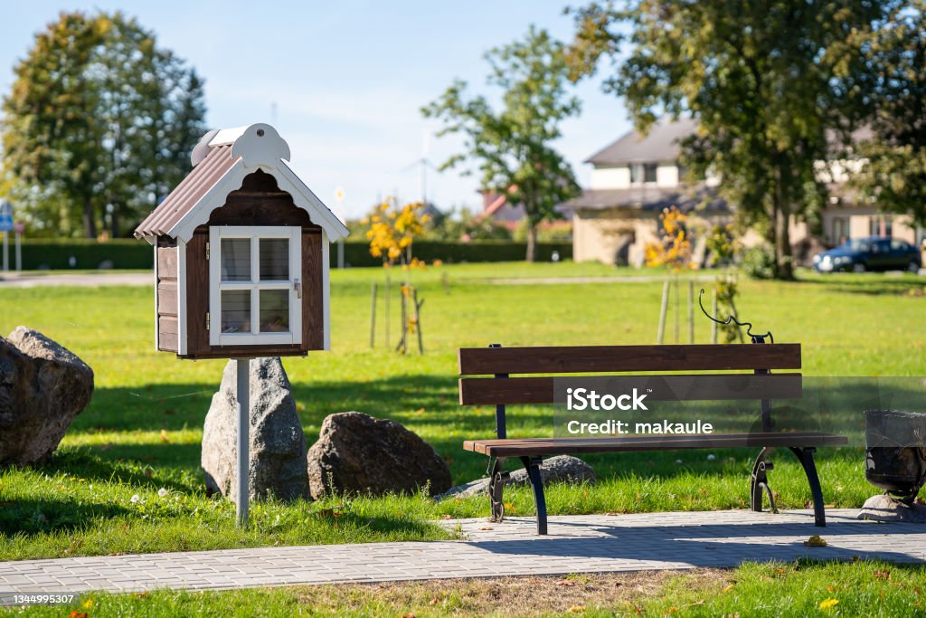 Free book sharing mini house Free book sharing mini house in the garden Library Stock Photo