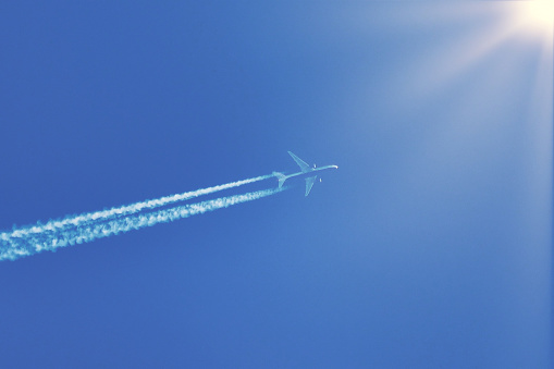 Airplane, contrail, blue sky, sun, sun rays, backgrounds