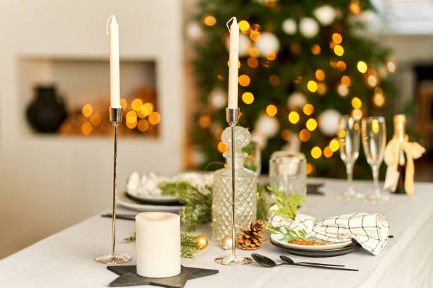 istock Light festive Christmas interior, set table for a festive dinner 1344996460