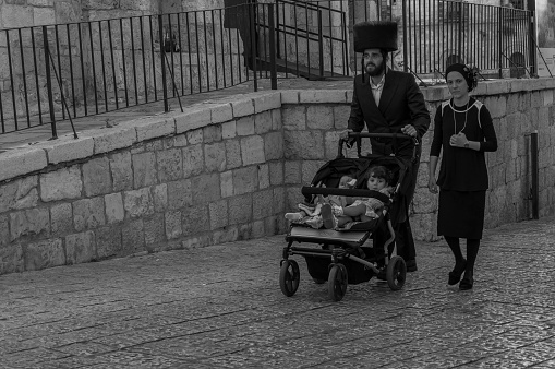 Jerusalem, Israel- April 30, 2022: Ultra-orthodox Jewish in the Mea Shearim neighborhood, Jerusalem, Israel., whis is also one of the most amazing things to see to travellers.
