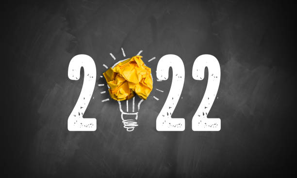 istock blackboard with message 2022 and the zero formed as a lightbulb 1345003756