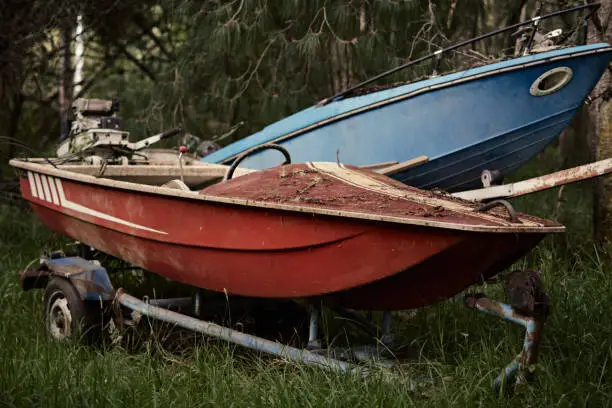 Photo of Old red and blue boats