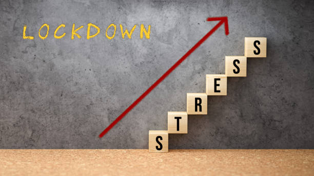 istock cubes forming a stair with the message LOCKDOWN STRESS - 3d illustration 1345004173