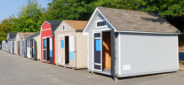 sheds for sale Row of demo garden sheds for sale. shed stock pictures, royalty-free photos & images
