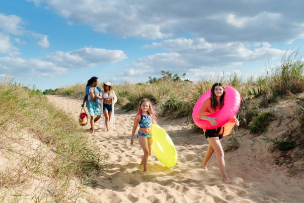 istock Family arriving at the beach 1345007120
