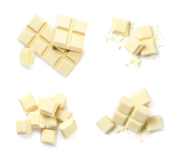 istock Set with pieces of delicious chocolate on white background, top view 1345009941