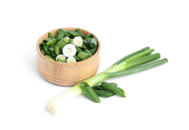 istock Fresh green spring onions isolated on white 1345010167