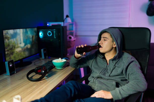 istock Handsome man watching a movie 1345016988
