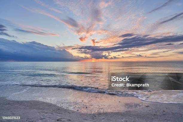 Vibrant Sunset At Sand Key Beach In Clearwater Florida Usa Stock Photo - Download Image Now