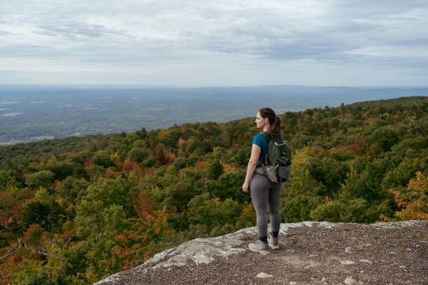 istock Women hiking on the mountain during autumn. 1345023377