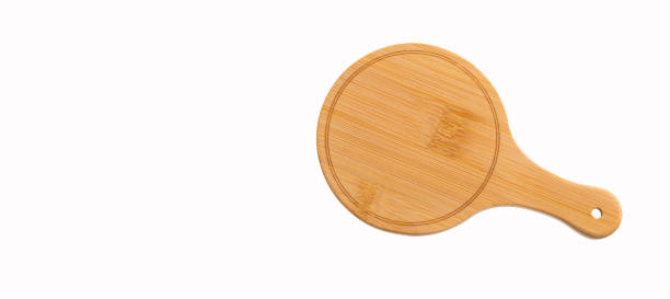 istock Round chopping board in the kitchen - White background 1345024241