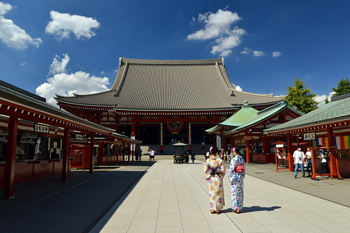 Japanese women in traditional japanese kimonos, on a sunny summer day in Tokyo, Japan