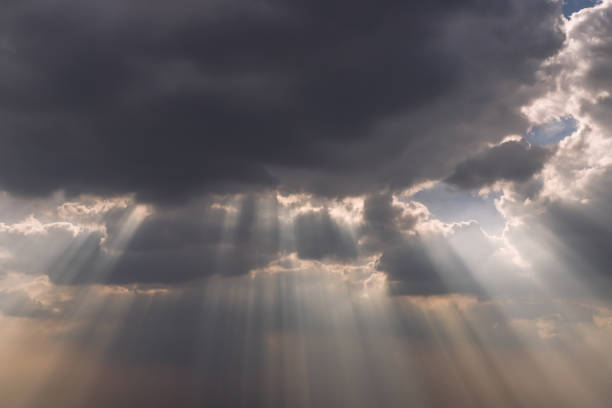 istock The sun's rays passing through the clouds and shining. 1345031010
