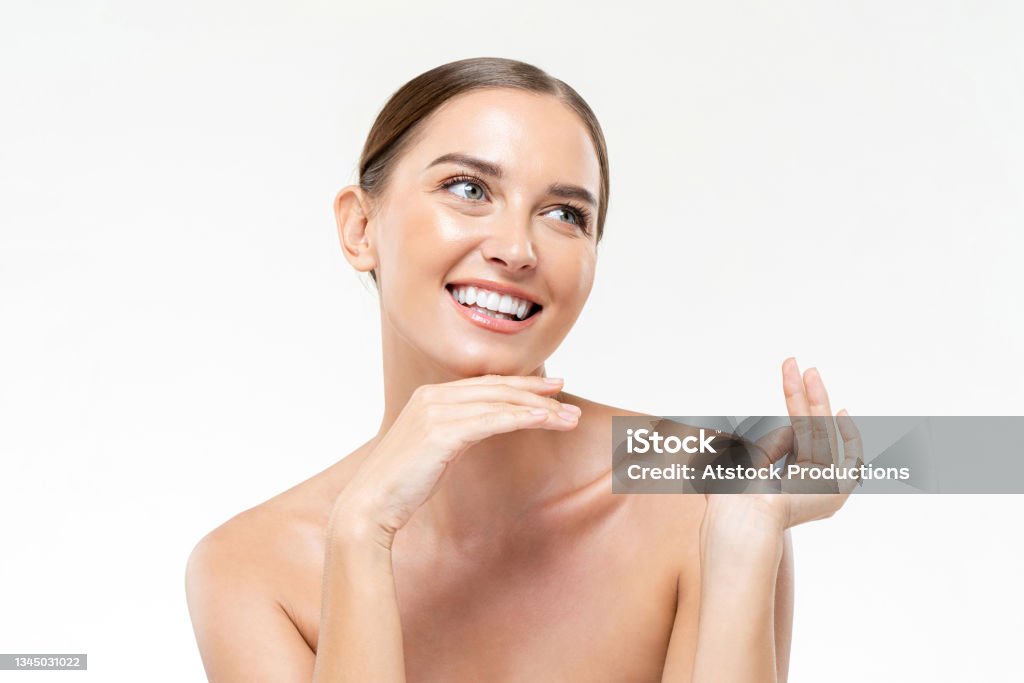 Smiling young beautiful Caucasian woman with healthy clear fresh skin on white isolated studio background 30-34 Years Stock Photo Smiling young beautiful Caucasian woman with healthy clear fresh skin on white isolated studio background 30-34 Years Stock Photo