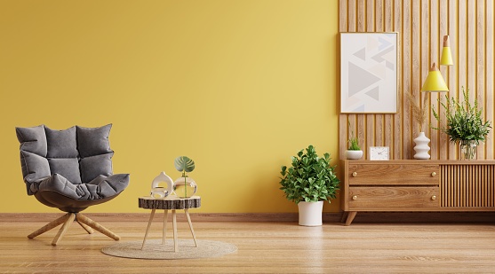 Modern Interior wall mockup with armchair on empty yellow wall background.3D rendering