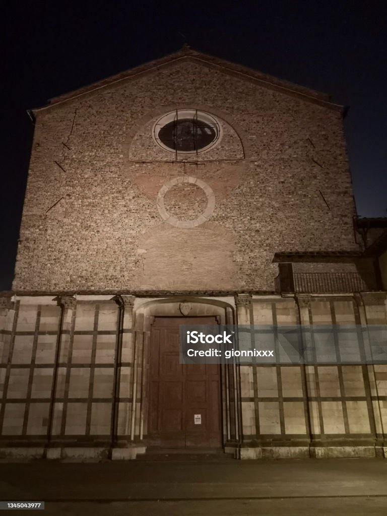San Domenico church in Prato by night, Tuscany San Domenico facade by night, a Romanesque-style Roman Catholic church in Prato, Tuscany Ancient Stock Photo