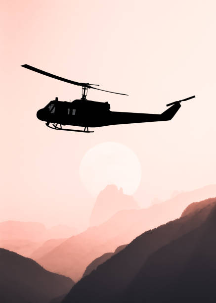 istock American utility military helicopter in the flight 1345045303