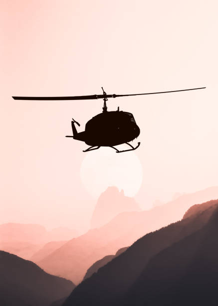 istock American utility military helicopter in the flight 1345045304
