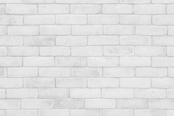 istock White grunge brick wall texture background for stone tile block painted in grey light color wallpaper modern interior and exterior and room backdrop design 1345048852