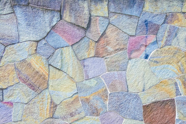 textura de fondo de pared de roca colorida - piedra material de construcción fotos fotografías e imágenes de stock