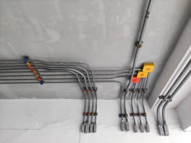 istock electrical line in tubes attached on the ceiling. 1345053386