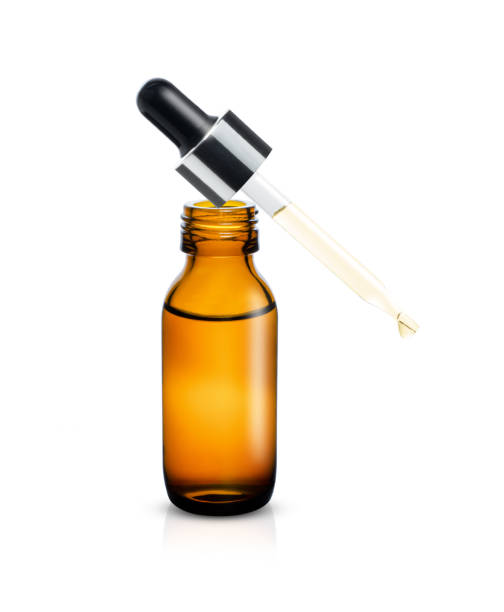 istock Bottle of essential oil with dropper 1345055320