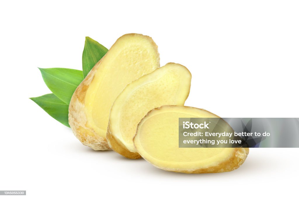 ginger white background. Fresh ginger slices with green leaves isolated on white background. Ginger - Spice Stock Photo