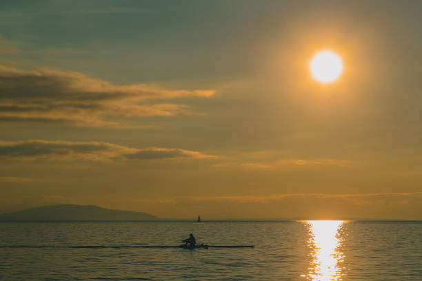 istock Paddler on a boat in evening 1345058938